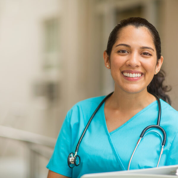 Portrait of young adult female healthcare professional stock photo